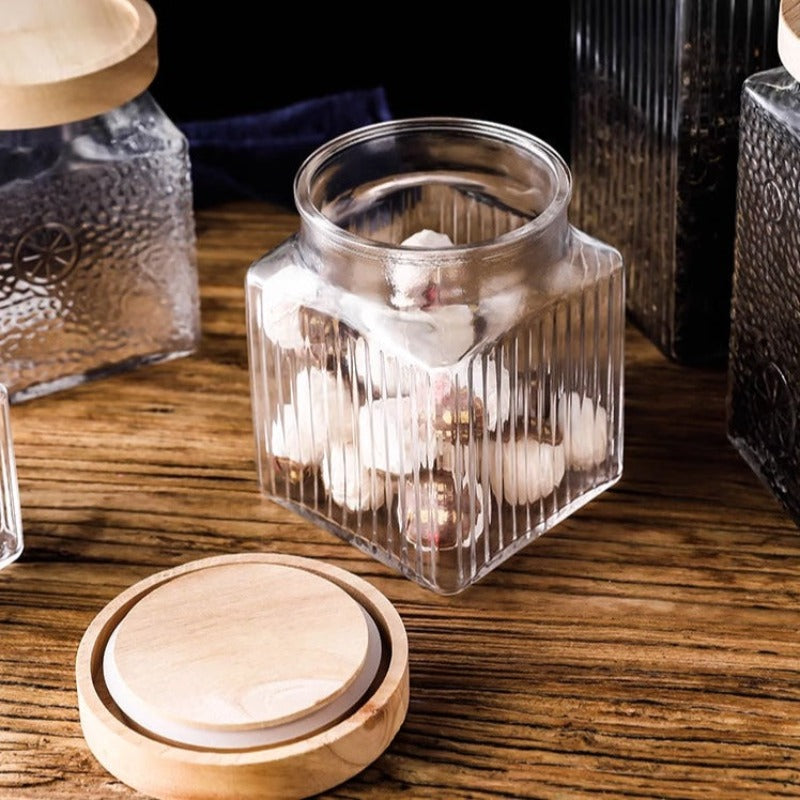 glass bottle with wooden lid